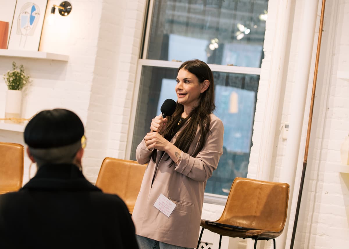 Vix Reitano speaking at an event